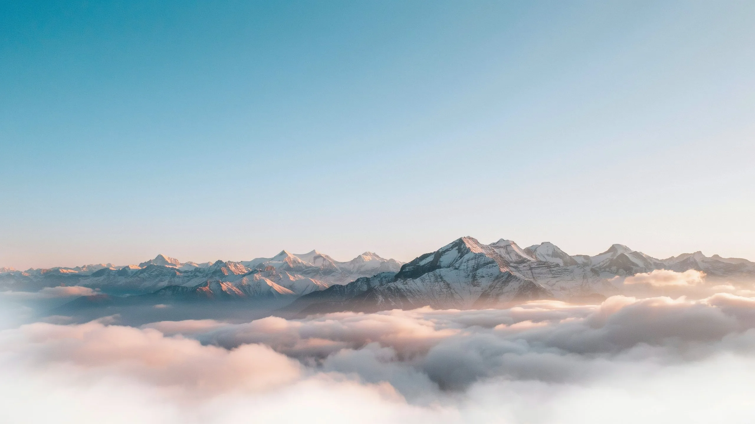 The Himalayas above the clouds at sunrise